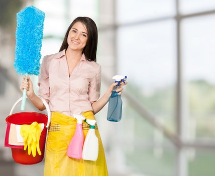 Staff member wearing PPE while carrying out carpet cleaning work