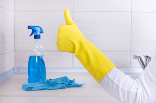 Carpet cleaning staff preparing equipment safely