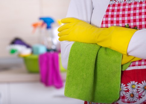 Professional upholstery cleaning on a fabric armchair
